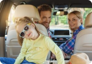 family in car